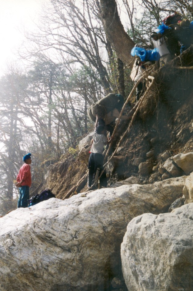 The porters had a tough job bypassing the flood damaged section